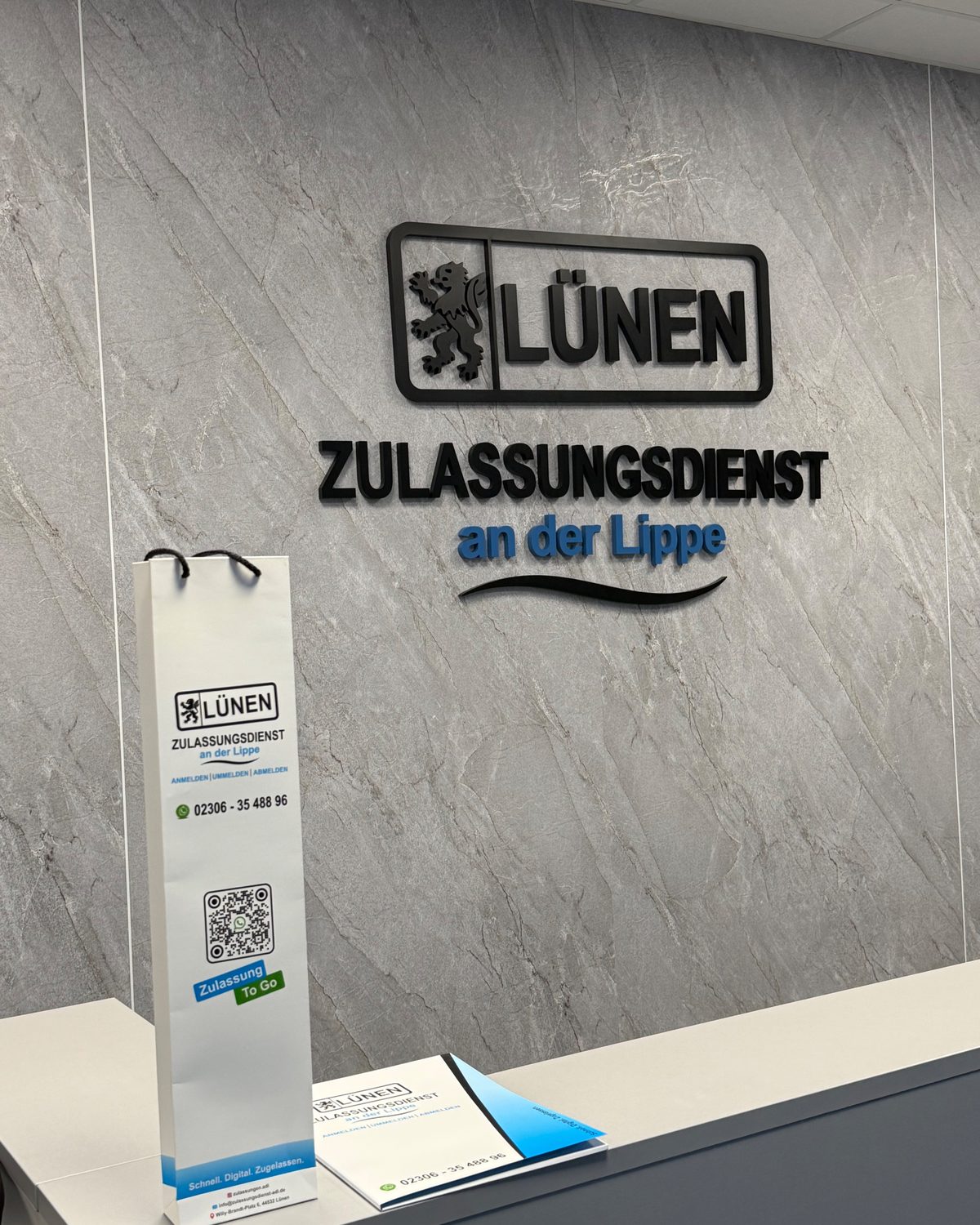3D-Wandlogo & Leuchtreklame für den Zulassungsdienst an der Lippe – Referenzprojekt von Visuellewand